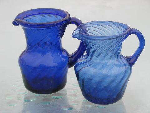 blue glass pitchers